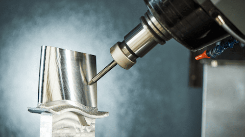 A close-up of the CNC metalworking machine